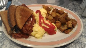 Never mind how delicious the eggs, bacon and home fries were (and they were scrumptious!!!).......how could anyone NOT enjoy a meal with Sam Cooke ("Bring It On Home To Me") and Elvis ("Jailhouse Rock") playing in the background??? 